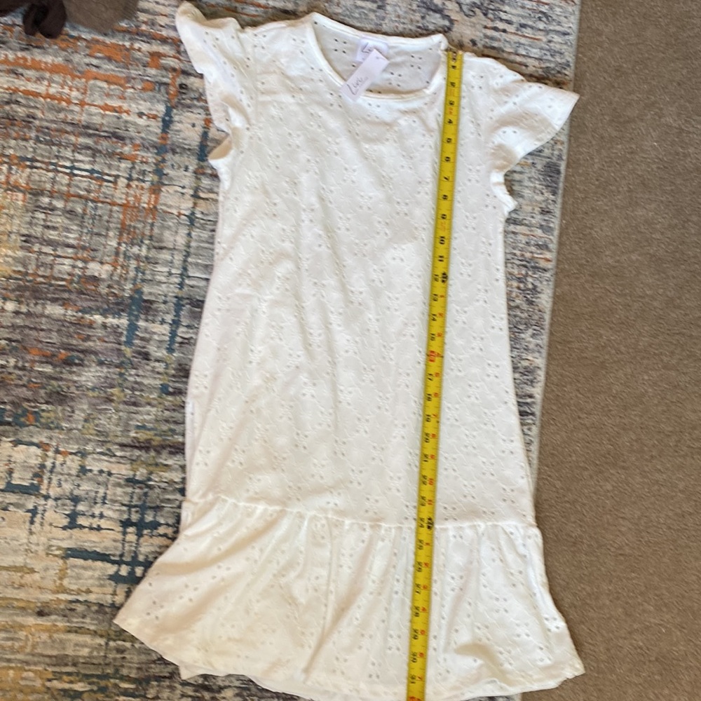 NEW W/ TAGS. Cute eyelet dress/attached liner. Flutter sleeves/ruffle hem. Med - Picture 6 of 6
